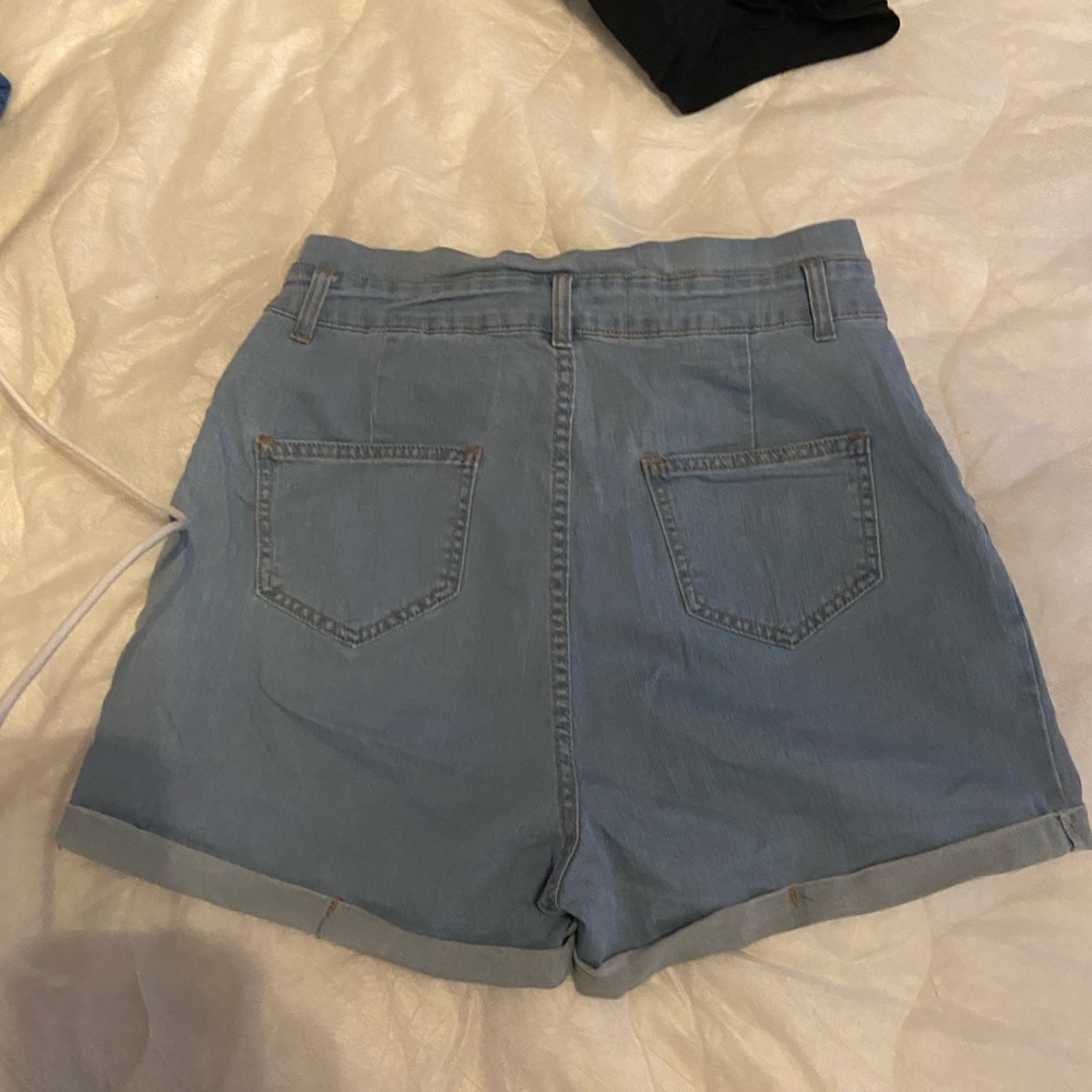 Medium light wash high waisted jean shorts